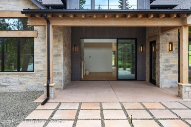 Tucked behind the gates of Aspen Glen, where the Roaring Fork on Aspen Glen Club in Colorado - for sale on GolfHomes.com, golf home, golf lot