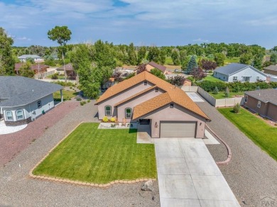 Nestled in the picturesque Cattails Golf Course community in on Cattails Golf Club in Colorado - for sale on GolfHomes.com, golf home, golf lot