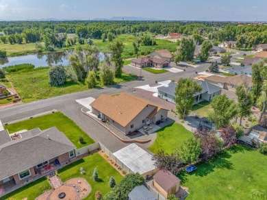 Nestled in the picturesque Cattails Golf Course community in on Cattails Golf Club in Colorado - for sale on GolfHomes.com, golf home, golf lot