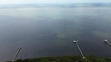 Discover your slice of paradise with this spacious 1.2-acre on St. James Bay in Florida - for sale on GolfHomes.com, golf home, golf lot