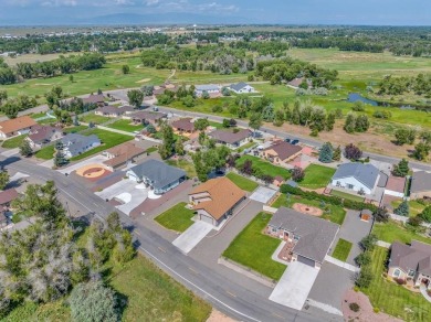 Nestled in the picturesque Cattails Golf Course community in on Cattails Golf Club in Colorado - for sale on GolfHomes.com, golf home, golf lot