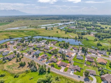 Nestled in the picturesque Cattails Golf Course community in on Cattails Golf Club in Colorado - for sale on GolfHomes.com, golf home, golf lot