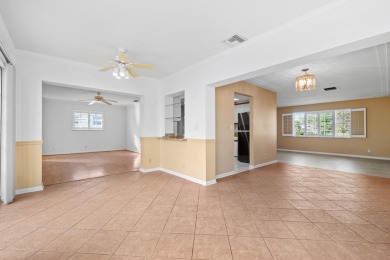 This Challenger model in desirable 55+ Palm Beach Leisureville on Leisureville Community Golf Course in Florida - for sale on GolfHomes.com, golf home, golf lot