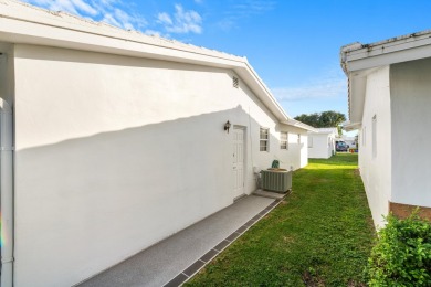 This Challenger model in desirable 55+ Palm Beach Leisureville on Leisureville Community Golf Course in Florida - for sale on GolfHomes.com, golf home, golf lot