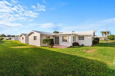 This Challenger model in desirable 55+ Palm Beach Leisureville on Leisureville Community Golf Course in Florida - for sale on GolfHomes.com, golf home, golf lot