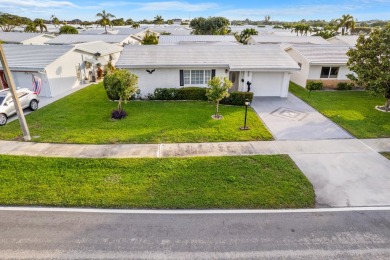 This Challenger model in desirable 55+ Palm Beach Leisureville on Leisureville Community Golf Course in Florida - for sale on GolfHomes.com, golf home, golf lot