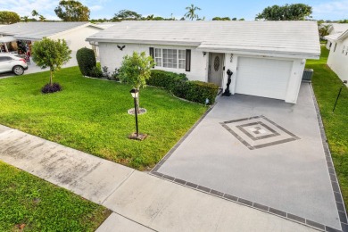 This Challenger model in desirable 55+ Palm Beach Leisureville on Leisureville Community Golf Course in Florida - for sale on GolfHomes.com, golf home, golf lot