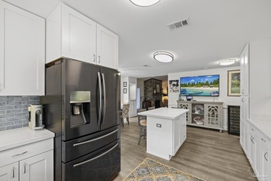 Welcome to this beautifully upgraded 3-bedroom, 2-bathroom home on Marcus Pointe Golf Club in Florida - for sale on GolfHomes.com, golf home, golf lot