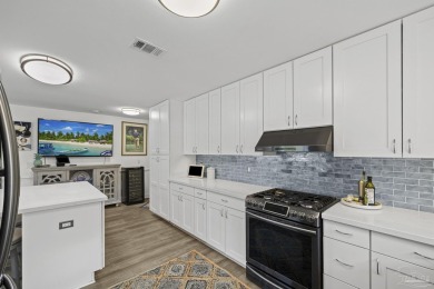 Welcome to this beautifully upgraded 3-bedroom, 2-bathroom home on Marcus Pointe Golf Club in Florida - for sale on GolfHomes.com, golf home, golf lot