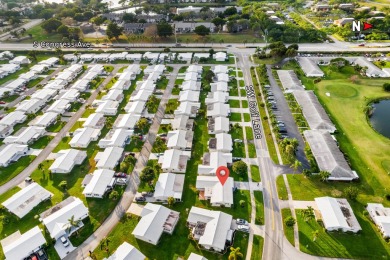 This Challenger model in desirable 55+ Palm Beach Leisureville on Leisureville Community Golf Course in Florida - for sale on GolfHomes.com, golf home, golf lot