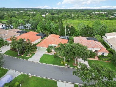 Beautifully maintained Lee Wetherington executive pool home on The Preserve Golf Club At Tara in Florida - for sale on GolfHomes.com, golf home, golf lot