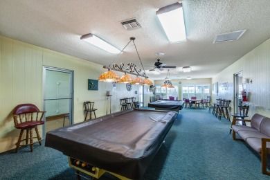 This Challenger model in desirable 55+ Palm Beach Leisureville on Leisureville Community Golf Course in Florida - for sale on GolfHomes.com, golf home, golf lot