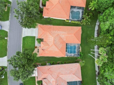 Beautifully maintained Lee Wetherington executive pool home on The Preserve Golf Club At Tara in Florida - for sale on GolfHomes.com, golf home, golf lot