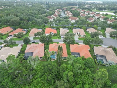 Beautifully maintained Lee Wetherington executive pool home on The Preserve Golf Club At Tara in Florida - for sale on GolfHomes.com, golf home, golf lot