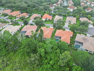 Beautifully maintained Lee Wetherington executive pool home on The Preserve Golf Club At Tara in Florida - for sale on GolfHomes.com, golf home, golf lot