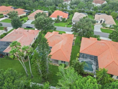 Beautifully maintained Lee Wetherington executive pool home on The Preserve Golf Club At Tara in Florida - for sale on GolfHomes.com, golf home, golf lot