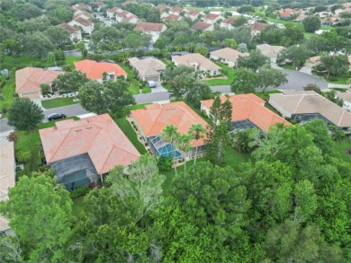 Beautifully maintained Lee Wetherington executive pool home on The Preserve Golf Club At Tara in Florida - for sale on GolfHomes.com, golf home, golf lot