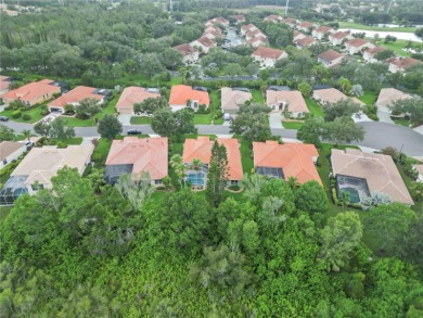 Beautifully maintained Lee Wetherington executive pool home on The Preserve Golf Club At Tara in Florida - for sale on GolfHomes.com, golf home, golf lot
