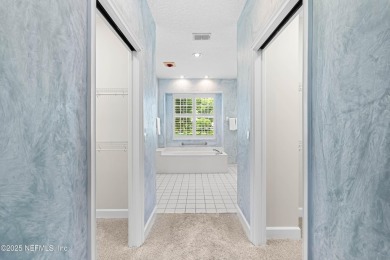 This LAKEFRONT HOME in CYPRESS VILLAGE is perfect for those on Windsor Parke Golf Club in Florida - for sale on GolfHomes.com, golf home, golf lot