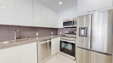 Enjoy breathtaking panoramic views from this beautifully on Turnberry Isle Resort and Club in Florida - for sale on GolfHomes.com, golf home, golf lot