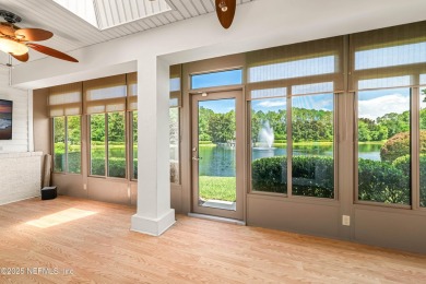 This LAKEFRONT HOME in CYPRESS VILLAGE is perfect for those on Windsor Parke Golf Club in Florida - for sale on GolfHomes.com, golf home, golf lot