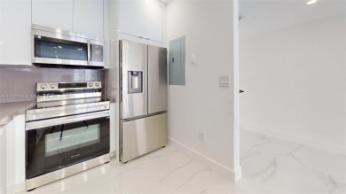 Enjoy breathtaking panoramic views from this beautifully on Turnberry Isle Resort and Club in Florida - for sale on GolfHomes.com, golf home, golf lot