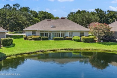 This LAKEFRONT HOME in CYPRESS VILLAGE is perfect for those on Windsor Parke Golf Club in Florida - for sale on GolfHomes.com, golf home, golf lot