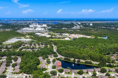 This LAKEFRONT HOME in CYPRESS VILLAGE is perfect for those on Windsor Parke Golf Club in Florida - for sale on GolfHomes.com, golf home, golf lot
