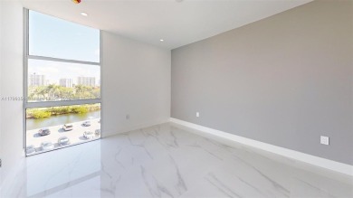 Enjoy breathtaking panoramic views from this beautifully on Turnberry Isle Resort and Club in Florida - for sale on GolfHomes.com, golf home, golf lot