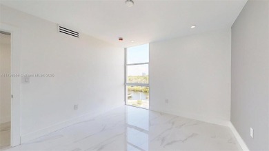 Enjoy breathtaking panoramic views from this beautifully on Turnberry Isle Resort and Club in Florida - for sale on GolfHomes.com, golf home, golf lot