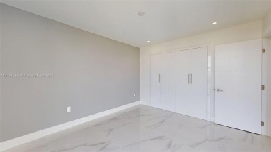 Enjoy breathtaking panoramic views from this beautifully on Turnberry Isle Resort and Club in Florida - for sale on GolfHomes.com, golf home, golf lot