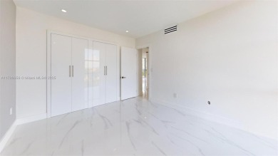 Enjoy breathtaking panoramic views from this beautifully on Turnberry Isle Resort and Club in Florida - for sale on GolfHomes.com, golf home, golf lot