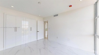 Enjoy breathtaking panoramic views from this beautifully on Turnberry Isle Resort and Club in Florida - for sale on GolfHomes.com, golf home, golf lot