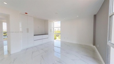 Enjoy breathtaking panoramic views from this beautifully on Turnberry Isle Resort and Club in Florida - for sale on GolfHomes.com, golf home, golf lot