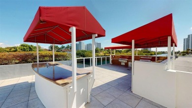 Enjoy breathtaking panoramic views from this beautifully on Turnberry Isle Resort and Club in Florida - for sale on GolfHomes.com, golf home, golf lot