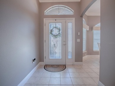 Come into a realm where quality and value unite harmoniously in on The Links of Spruce Creek in Florida - for sale on GolfHomes.com, golf home, golf lot