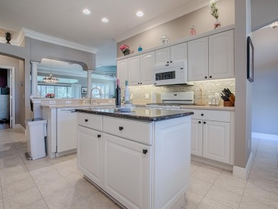 Come into a realm where quality and value unite harmoniously in on The Links of Spruce Creek in Florida - for sale on GolfHomes.com, golf home, golf lot
