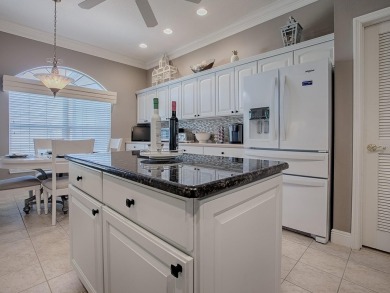 Come into a realm where quality and value unite harmoniously in on The Links of Spruce Creek in Florida - for sale on GolfHomes.com, golf home, golf lot