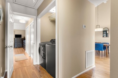 This beautifully updated end-unit condo offers effortless on Holly Tree Country Club in South Carolina - for sale on GolfHomes.com, golf home, golf lot