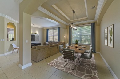Welcome to this stunning estate home nestled within a premier on Hammock Creek Golf Club in Florida - for sale on GolfHomes.com, golf home, golf lot