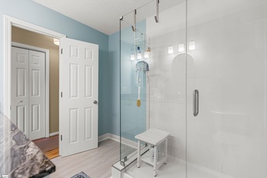 This beautifully updated end-unit condo offers effortless on Holly Tree Country Club in South Carolina - for sale on GolfHomes.com, golf home, golf lot