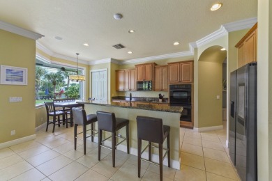 Welcome to this stunning estate home nestled within a premier on Hammock Creek Golf Club in Florida - for sale on GolfHomes.com, golf home, golf lot