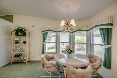 This beautiful 2-bedroom, 2-bathroom home is located in the on Lake Fairways Country Club in Florida - for sale on GolfHomes.com, golf home, golf lot