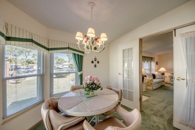This beautiful 2-bedroom, 2-bathroom home is located in the on Lake Fairways Country Club in Florida - for sale on GolfHomes.com, golf home, golf lot