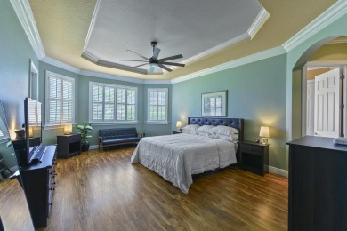 Welcome to this stunning estate home nestled within a premier on Hammock Creek Golf Club in Florida - for sale on GolfHomes.com, golf home, golf lot