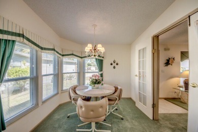 This beautiful 2-bedroom, 2-bathroom home is located in the on Lake Fairways Country Club in Florida - for sale on GolfHomes.com, golf home, golf lot
