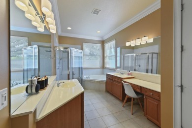 Welcome to this stunning estate home nestled within a premier on Hammock Creek Golf Club in Florida - for sale on GolfHomes.com, golf home, golf lot