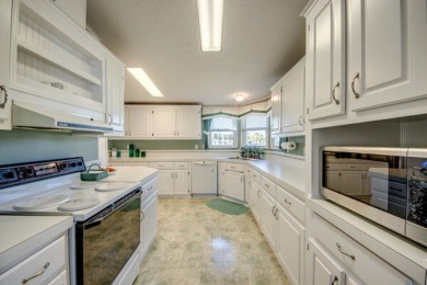 This beautiful 2-bedroom, 2-bathroom home is located in the on Lake Fairways Country Club in Florida - for sale on GolfHomes.com, golf home, golf lot