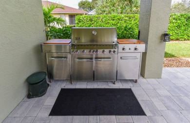 Welcome to this stunning estate home nestled within a premier on Hammock Creek Golf Club in Florida - for sale on GolfHomes.com, golf home, golf lot