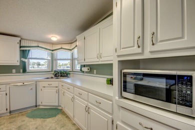 This beautiful 2-bedroom, 2-bathroom home is located in the on Lake Fairways Country Club in Florida - for sale on GolfHomes.com, golf home, golf lot
